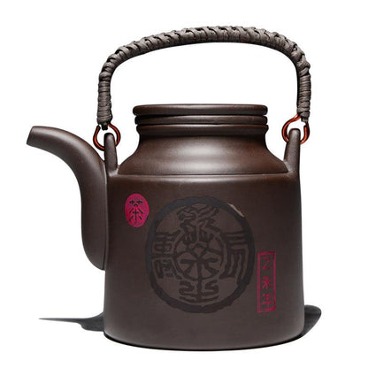Théière artisanale en argile violette – 720 ml, anse en rotin ou cuivre