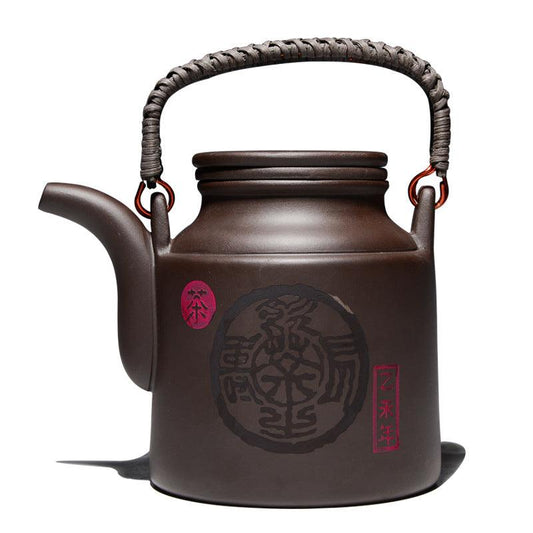 Théière artisanale en argile violette – 720 ml, anse en rotin ou cuivre